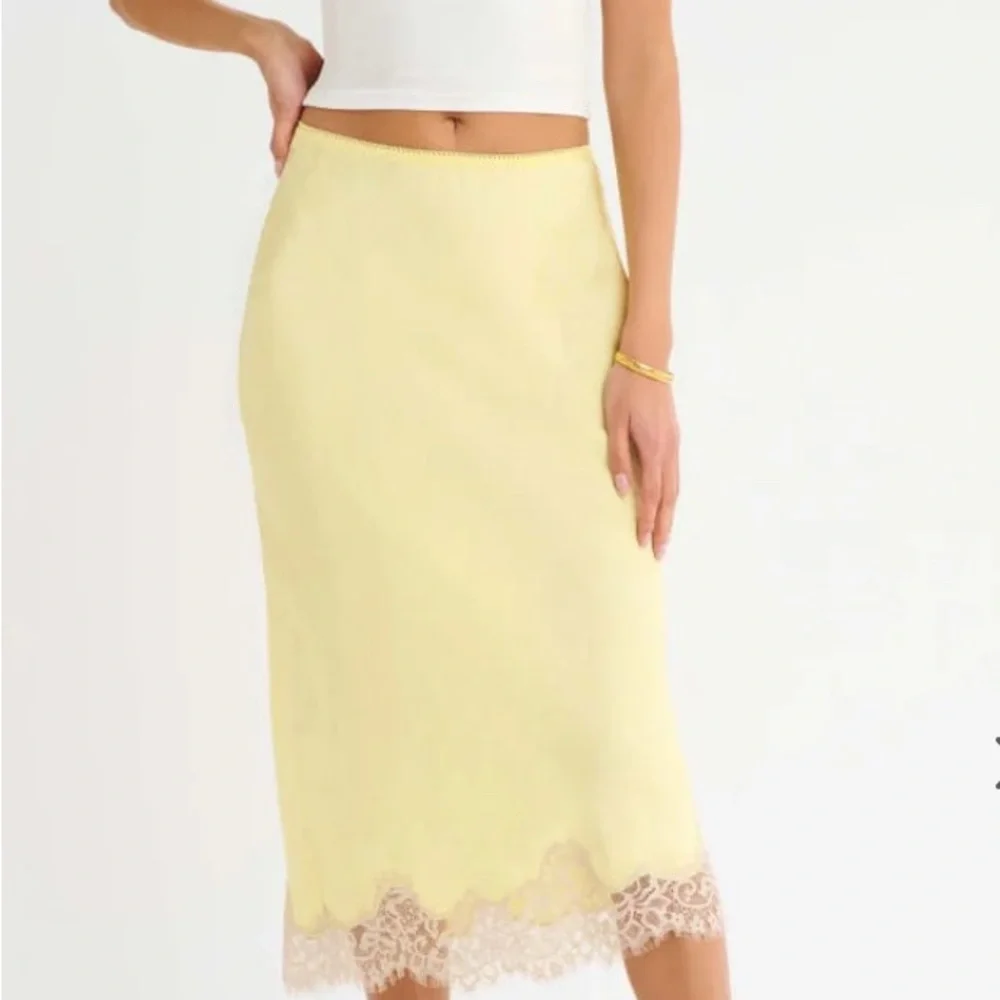 Rumored Pale Yellow Midi Skirt with Lace Hem
